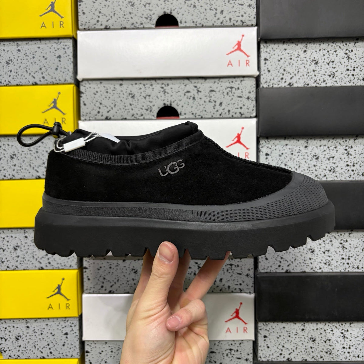 UGG Neumeel Deco Slip-On – Suede Moccasin Sneaker in All Black with Carabiner Collar & Black Lug Sole